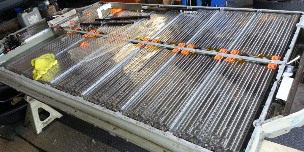 tesla battery tear down e1454534108386 Tesla Safety Features Make It's Brand best among the rest | Read the 3 major points below to know more
