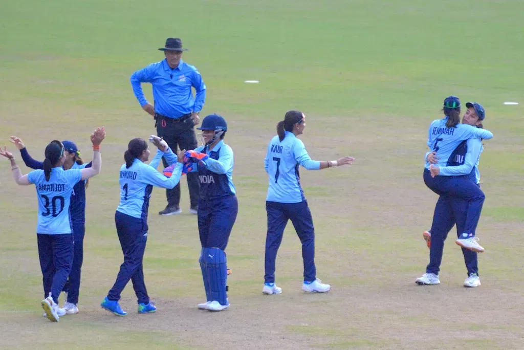 Women in Blue captained by Harmanpreet Kaur clinched a memorable gold medal in Asian Games 2023 Gold Image via Twitter Historic Victory: Indian Women’s Cricket Team Claims Asian Games 2023 Gold