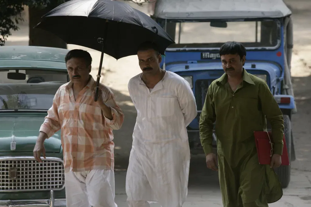 Piyush MishraIn left as Nasir Ahmed in Gangs of Wasseypur Image Credits IMDb Top 9 Most Iconic Supporting Roles in Bollywood Movies That Won Everyone's Hearts