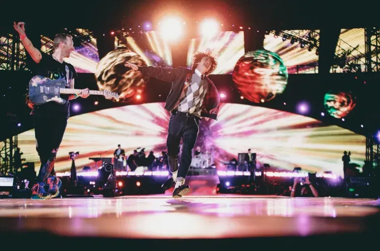 Coldplay Epic Moment: BTS Jin Astronaut Takes Center Stage!
