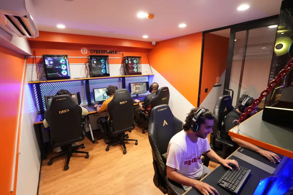 Gamers playing on the high performance systems of cyberpowerpc india at apecity